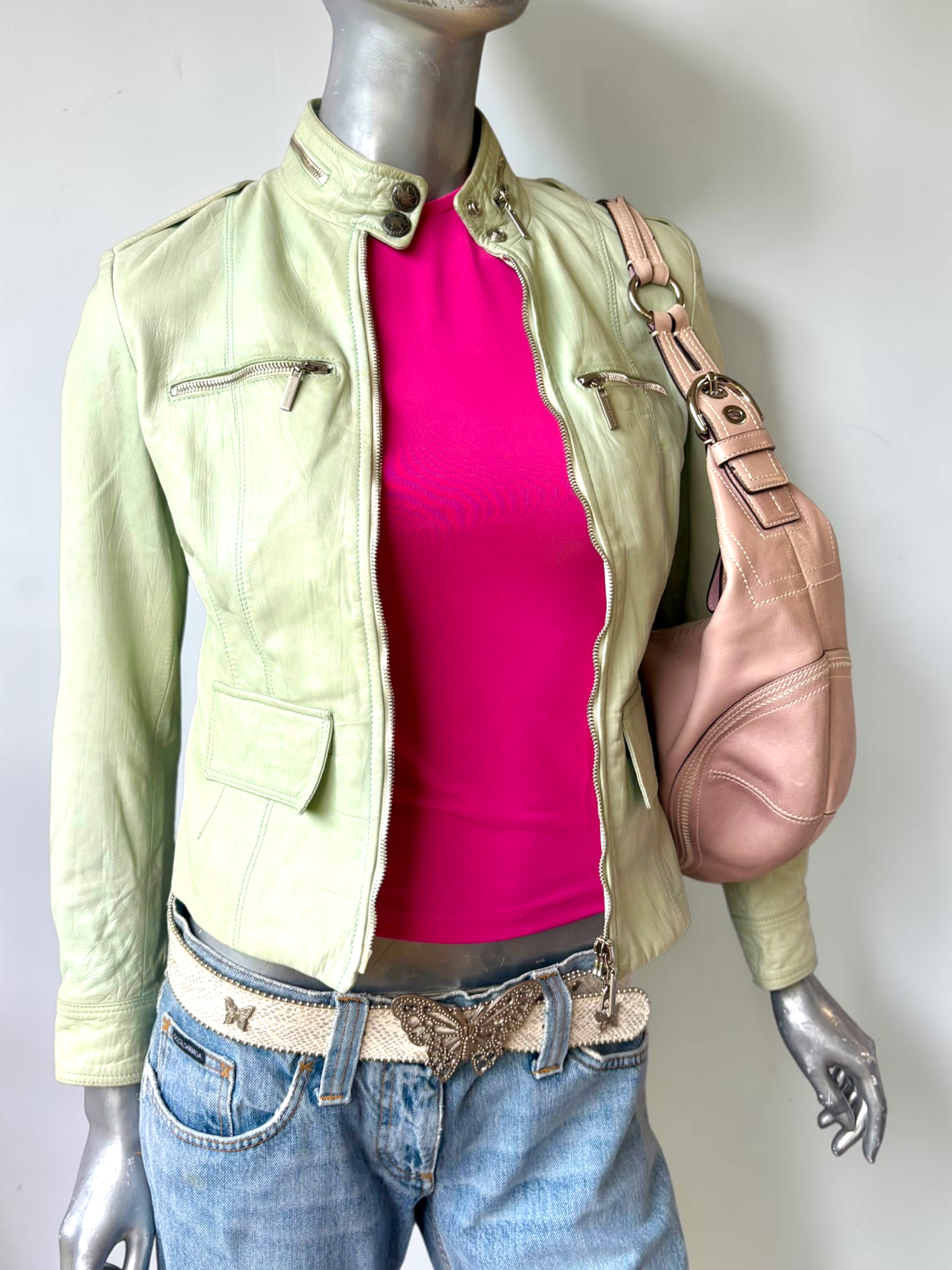 Vintage Italian leather sage green moto jacket styled close up