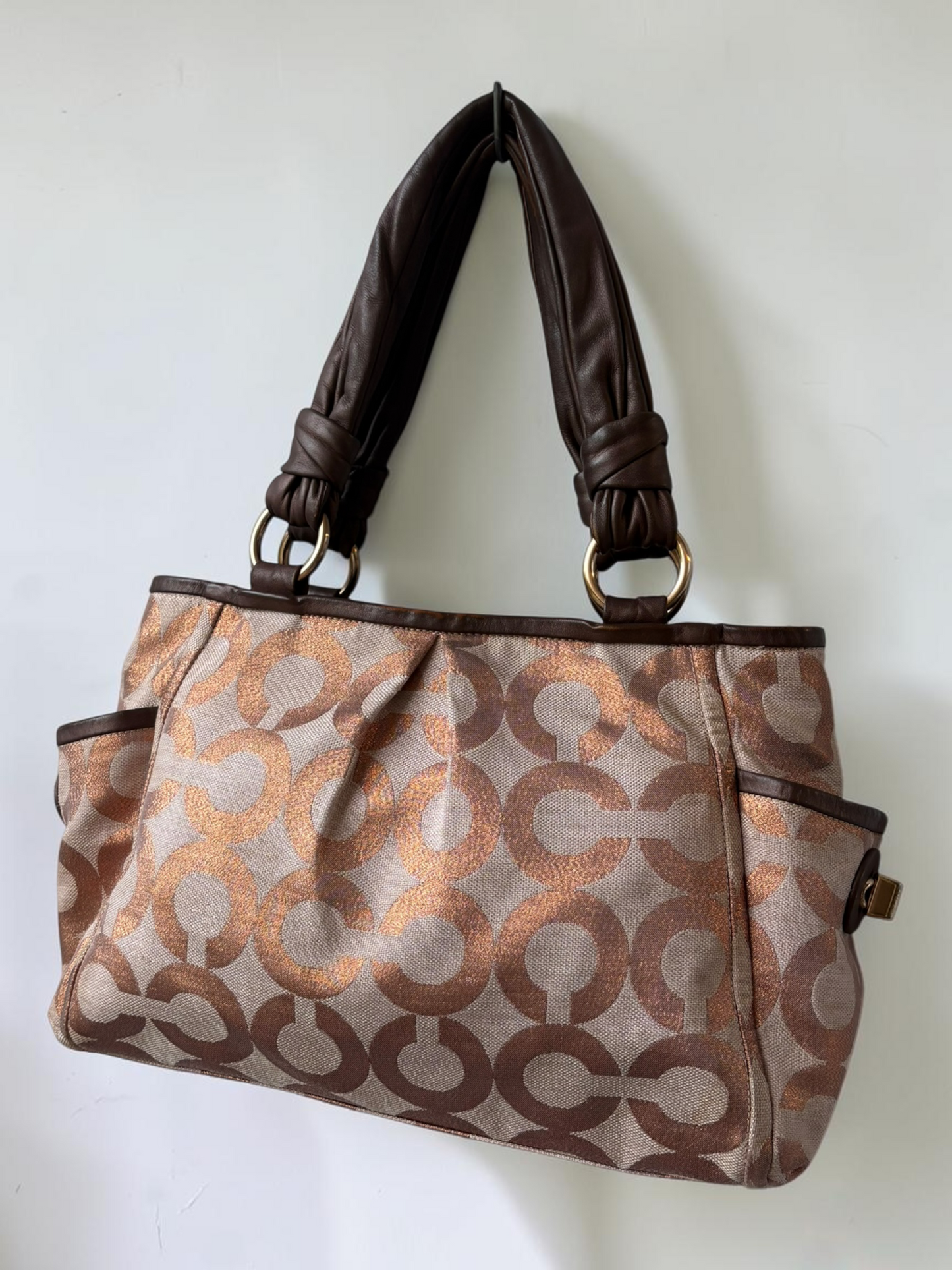 Vintage Coach metallic signature tote side pocket detail