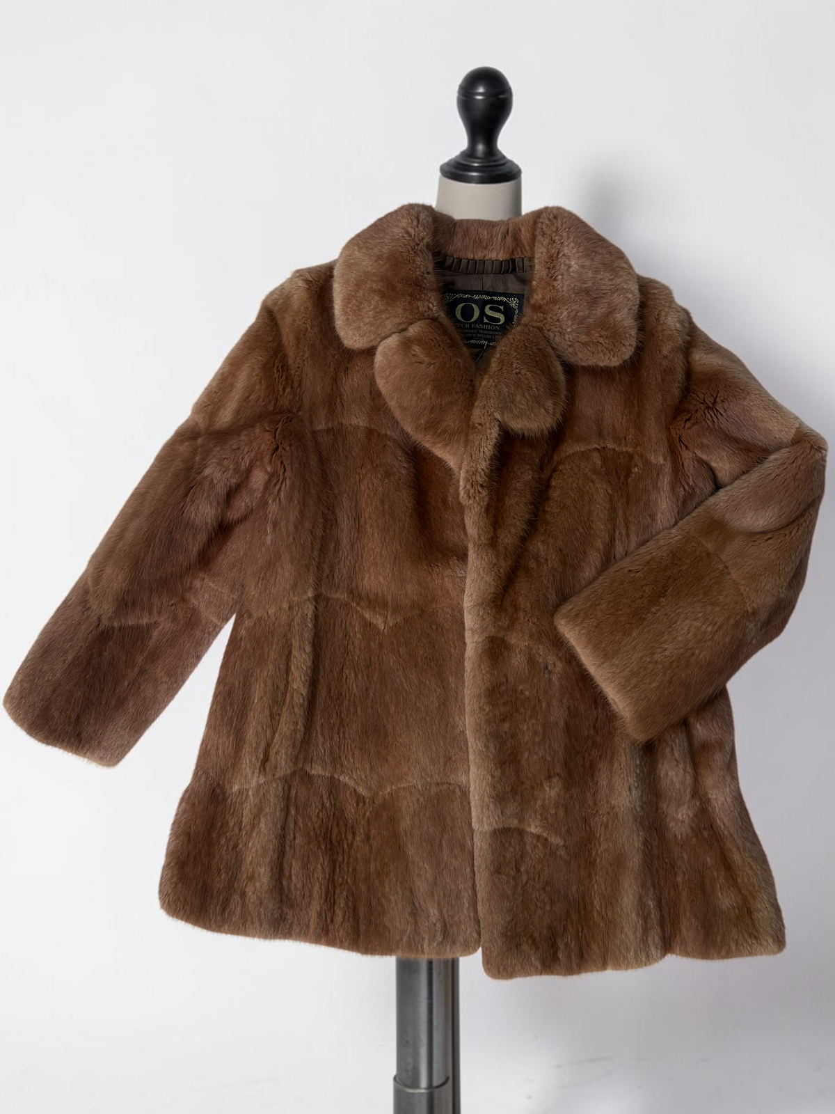 Vintage caramel faux fur coat close up